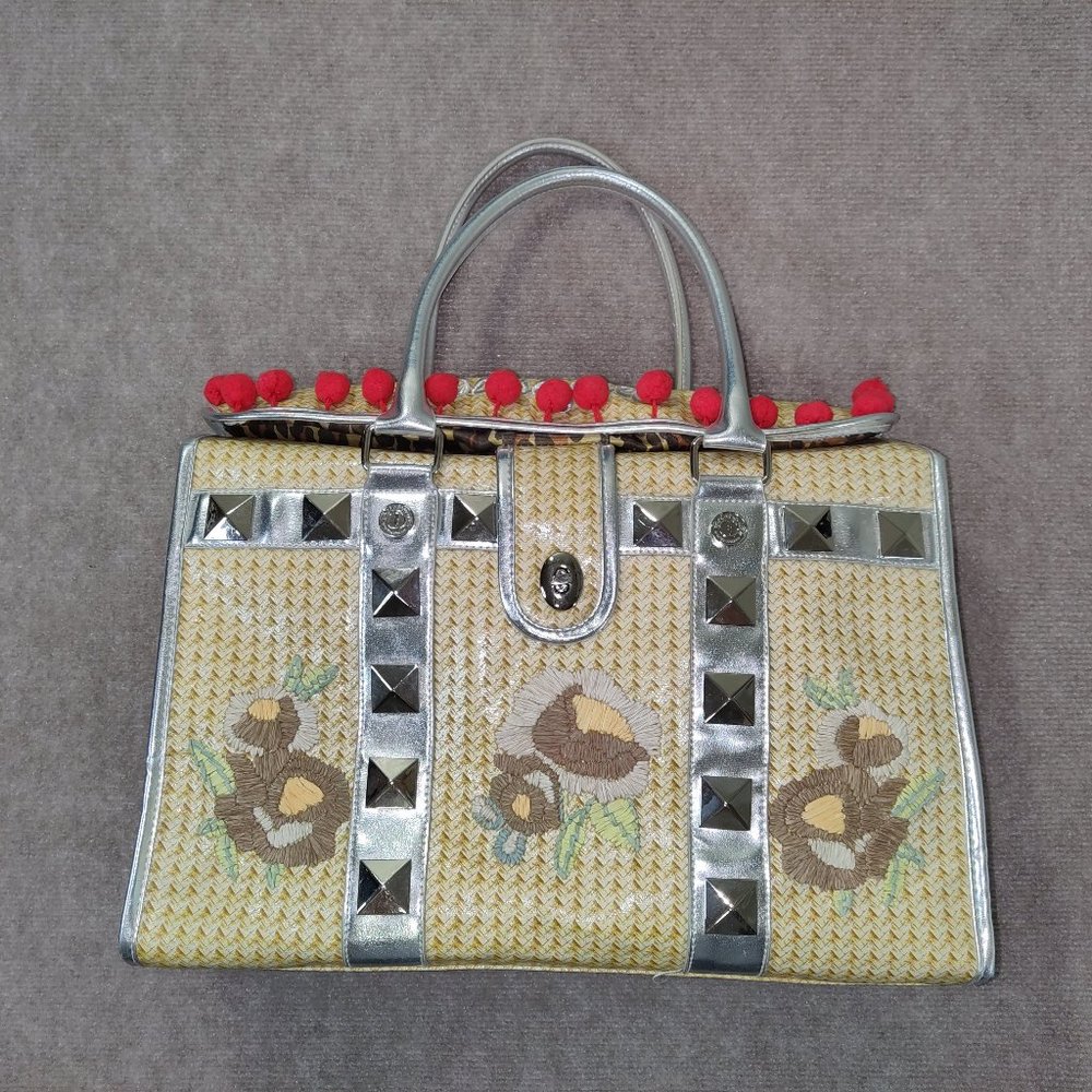 Betseyville by Betsey Johnson Faux wicker with red pom poms